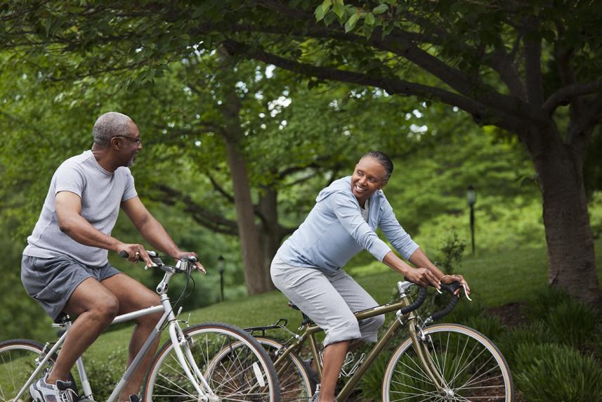 Man and woman riding bikes