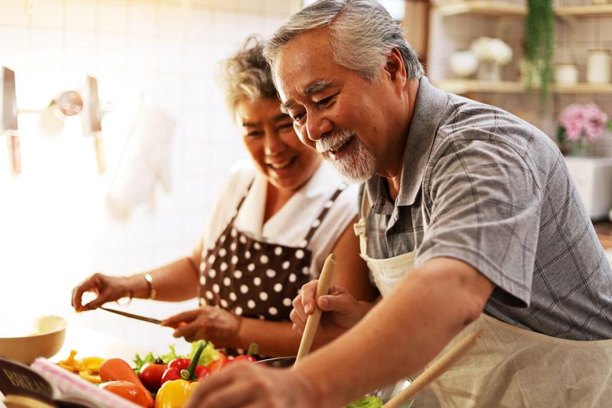Senior couple cooking together