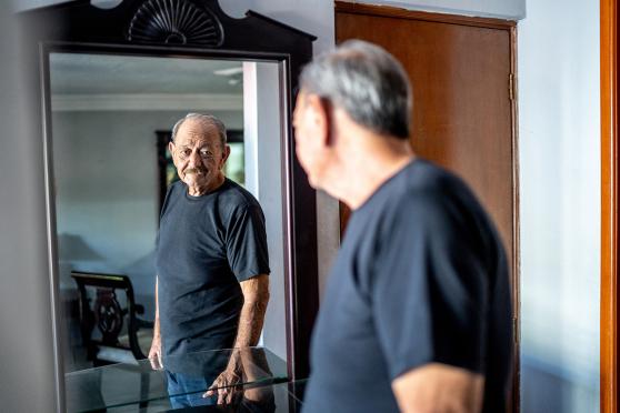 Man thinking about colonoscopy and at-home colon cancer screening